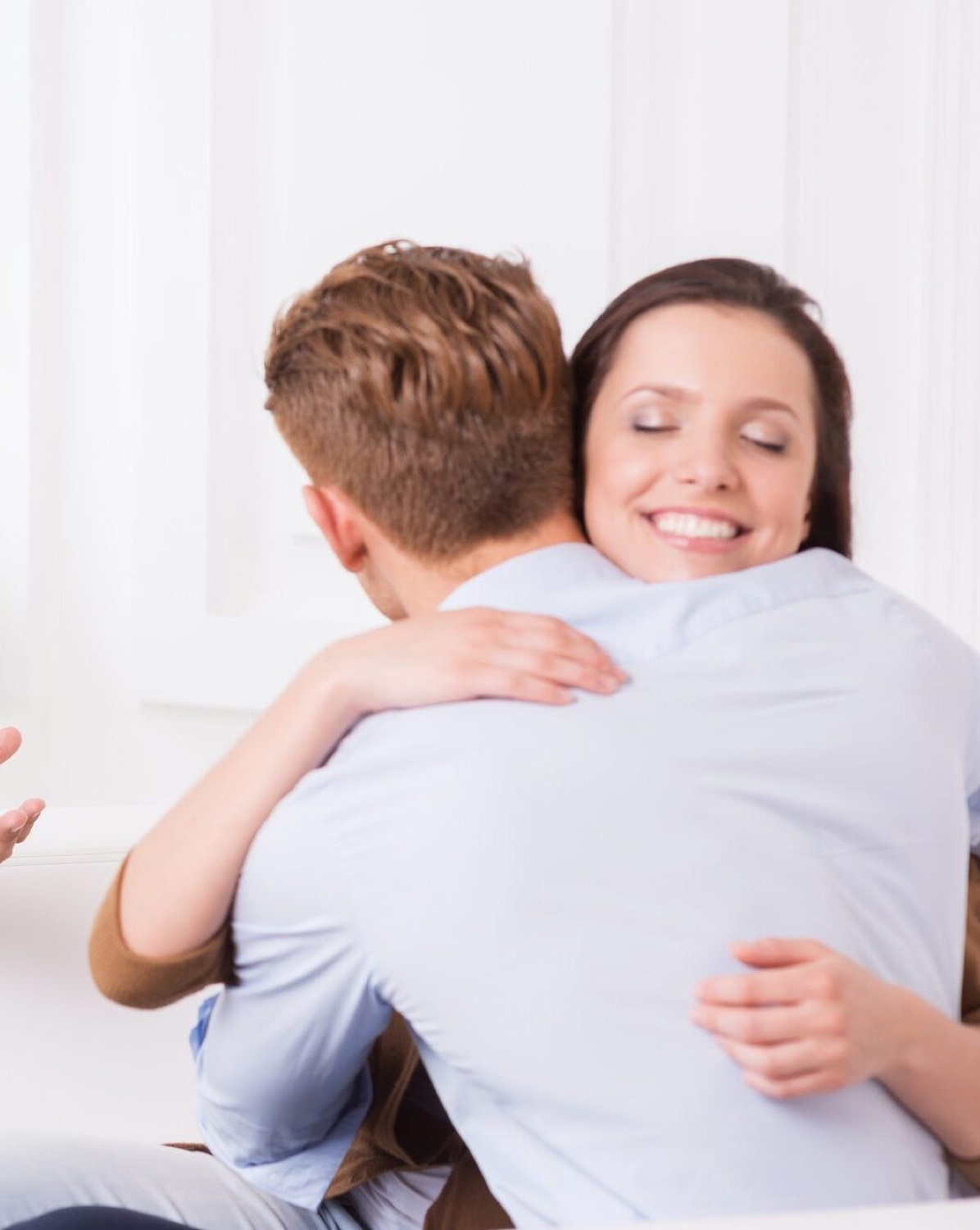 A couple in a supportive relationship counselling session in Brighton & Hove